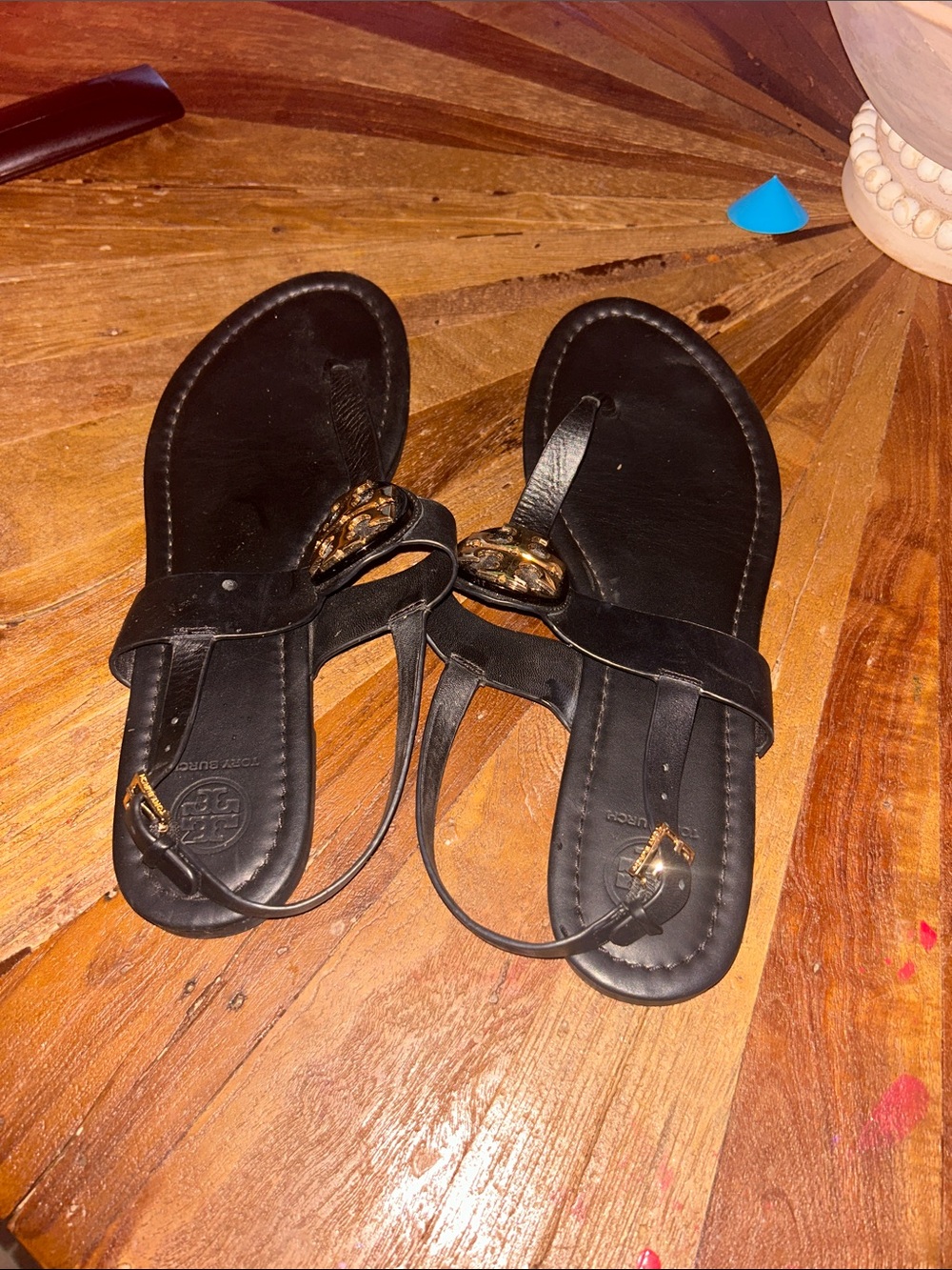 Tory Burch Black Leather T-Strap Sandals with Gold Logo Accents - Picture 2 of 4